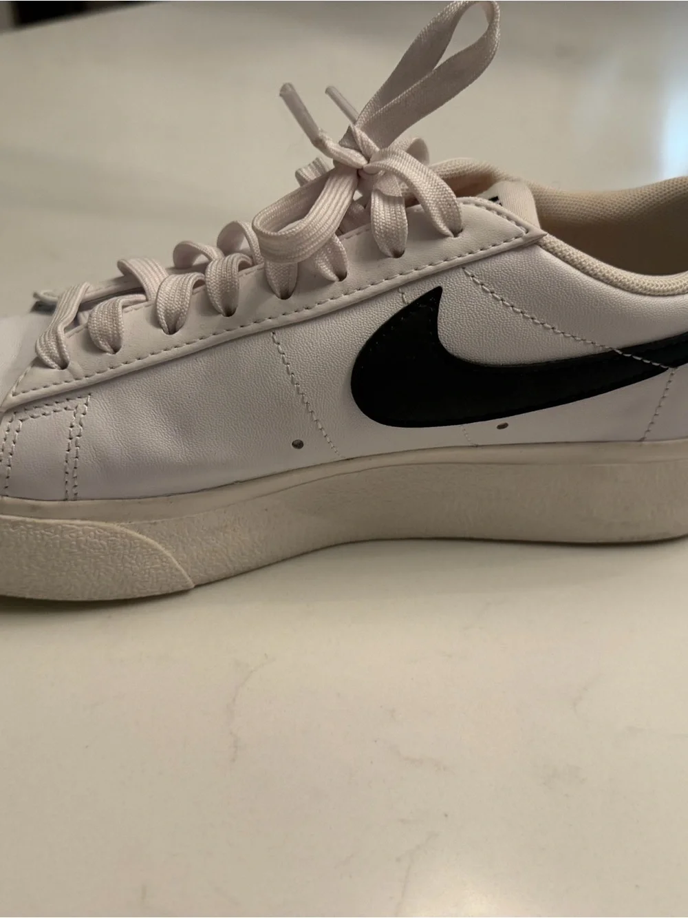Nike Woman’s White & Black Low-Top Sneakers